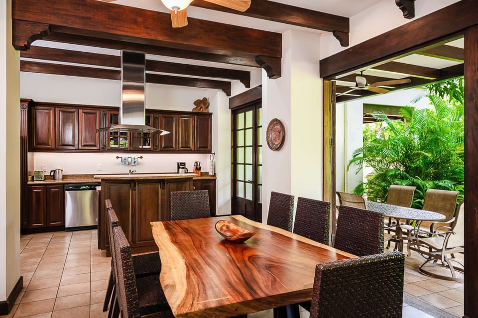 modern kitchen with guanacaste table