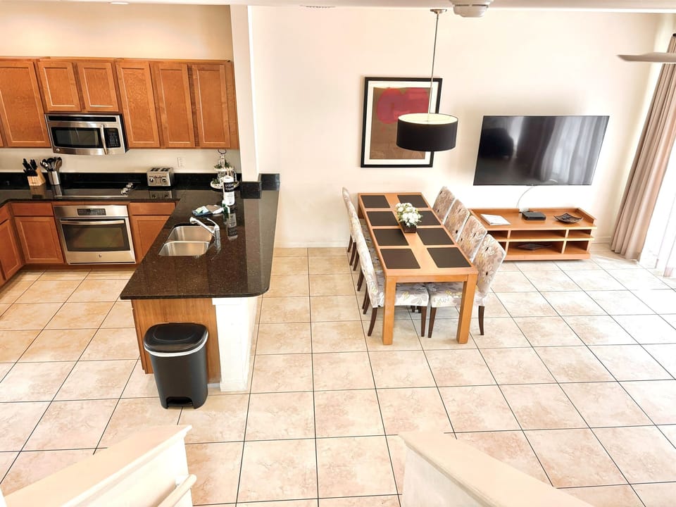 Kitchen, dining room and TV area