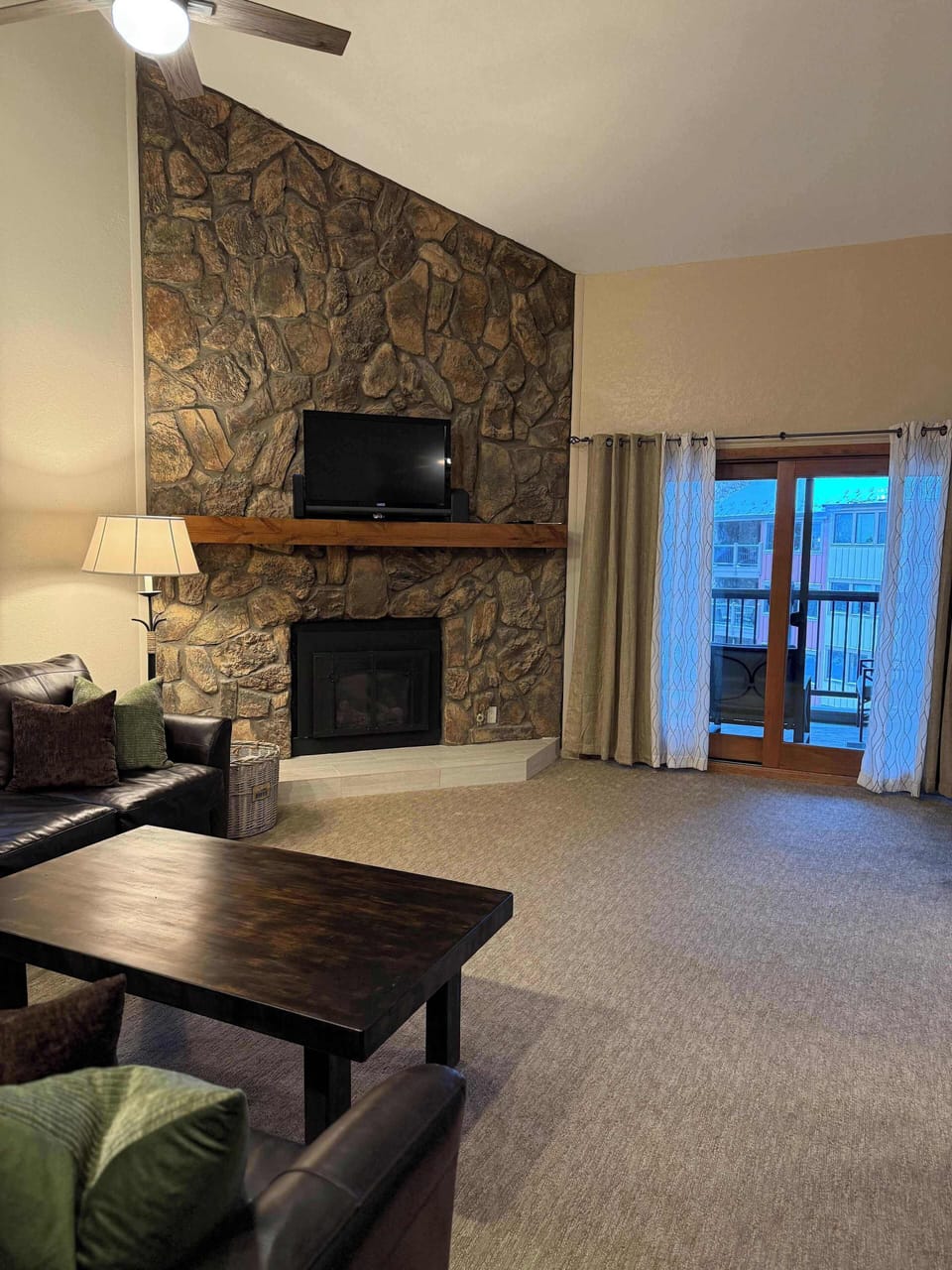 Living room: Gas fireplace, Smart TV with satellite channels, electric baseboard heating, no A/C