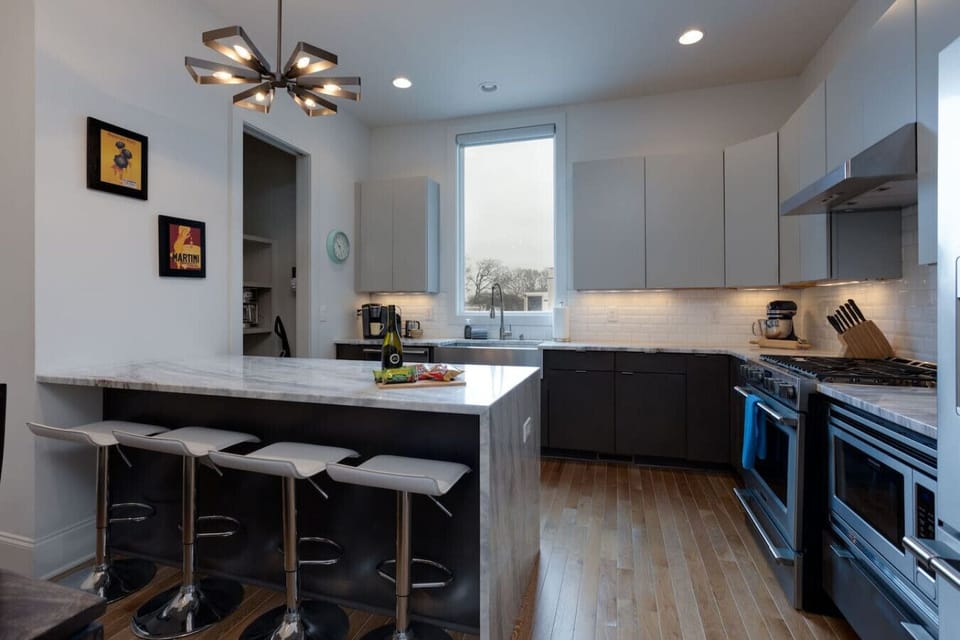 Spacious kitchen island designed with seating for four