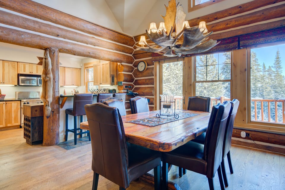 Attractive Alaska moose horn chandler. MT log crafted table.