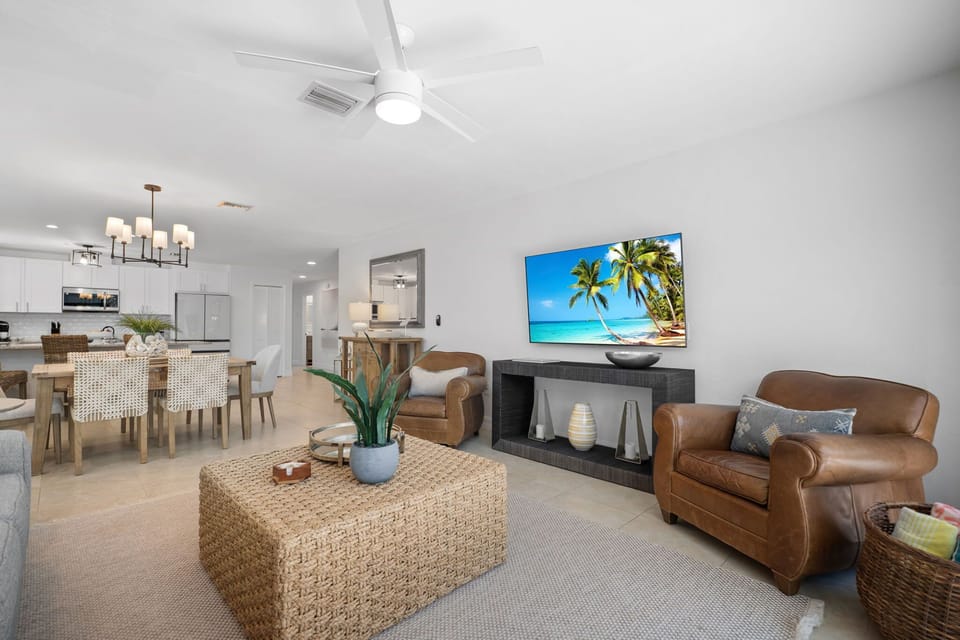 Open floor plan from the kitchen to living room with dining area in between. 