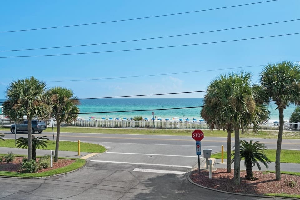 Stunning, unobstructed Gulf views from the 2nd floor private patio - Private beach access is right across the street - no condo crowds here!