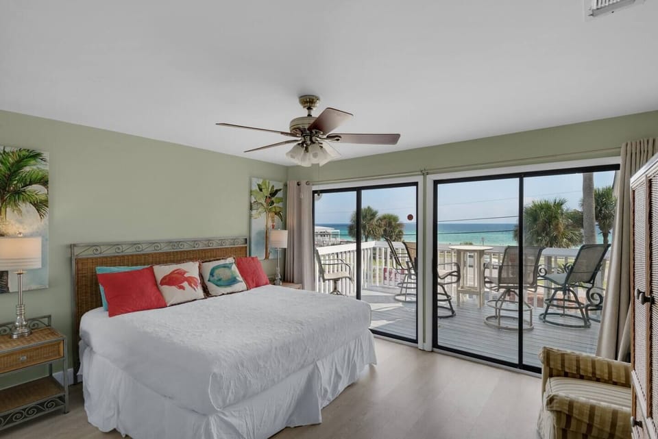 King bed in the primary bedroom with big GULF views from private patio - imagine enjoying your morning coffee or a cold afternoon beverage soaking in these views of Destin's famous Emerald waters!