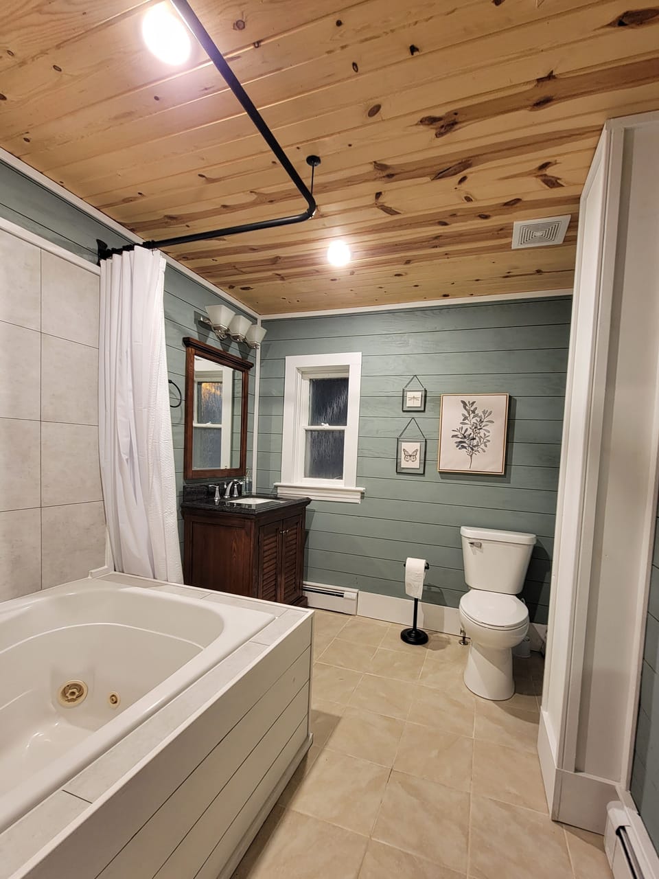 Main floor bathroom with full shower