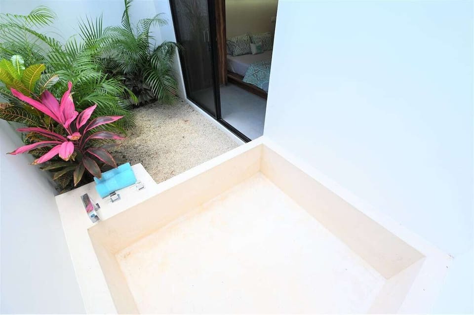 Private Outdoor Warm Tub. This area is directly connected to your Bedroom
