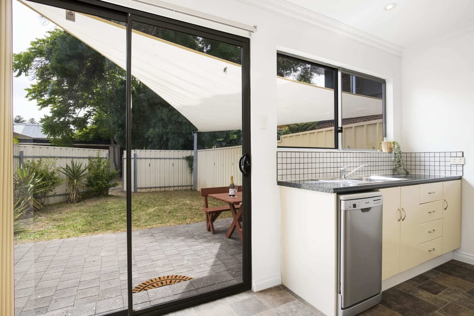 Kitchen with access to outdoor dining