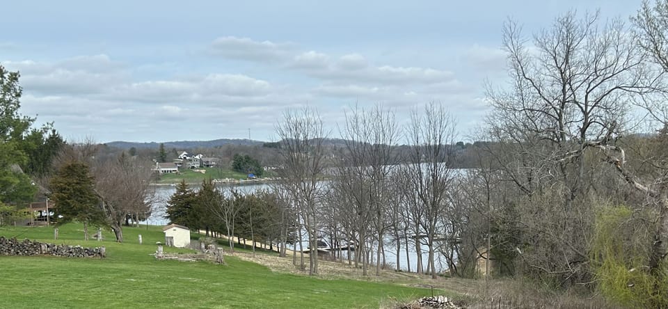 Access to trail, lake, docks, and fishing directly behind the home