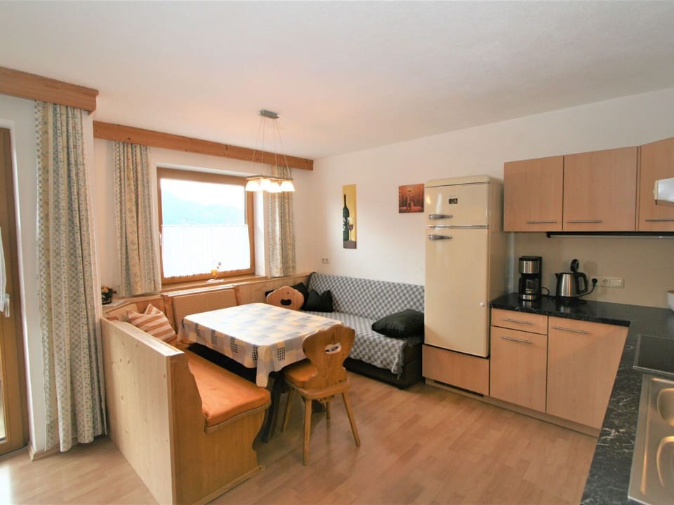 Cabinetry, Table, Window, Curtain, Kitchen Appliance, Wood, Home Appliance, Floor, Drawer, Flooring