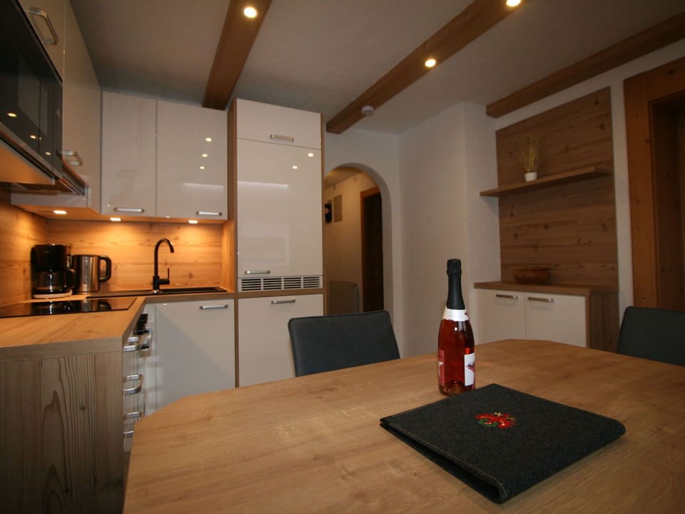 Furniture, Table, Cabinetry, Wood, Interior Design, Flooring, Kitchen, Architecture, Floor, House