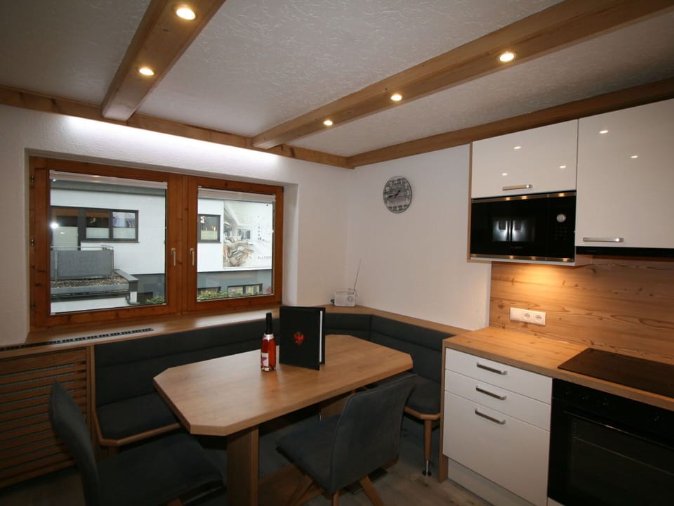 Furniture, Property, Table, Cabinetry, Building, Wood, Lighting, Countertop, Interior Design, Kitchen