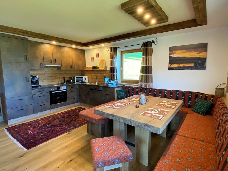 Table, Furniture, Property, Cabinetry, Countertop, Wood, Lighting, Interior Design, Floor, Flooring