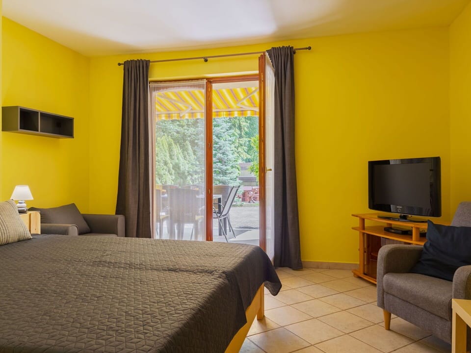 Interior Design, Furniture, Floor, Flooring, Room, Ceiling, Curtain, Chair, Wood Stain, Bed