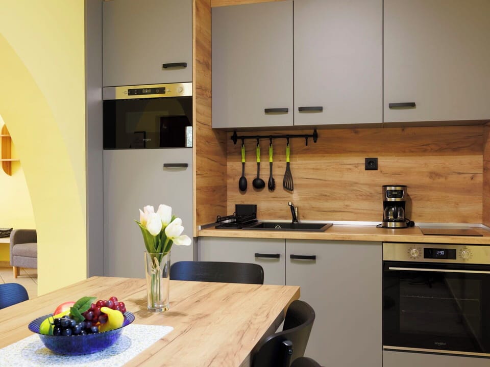 Furniture, Kitchen, Countertop, Kitchen Appliance, Interior Design, Wood, Cabinetry, Flooring, Major Appliance, Home Appliance