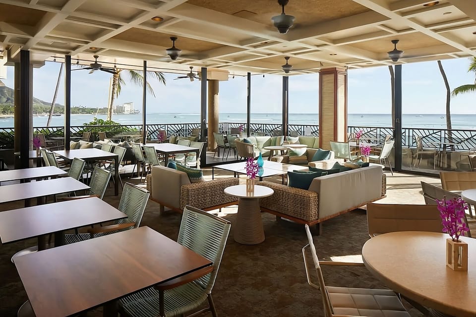 Gather for sunset cocktails in the airy seaside lounge.