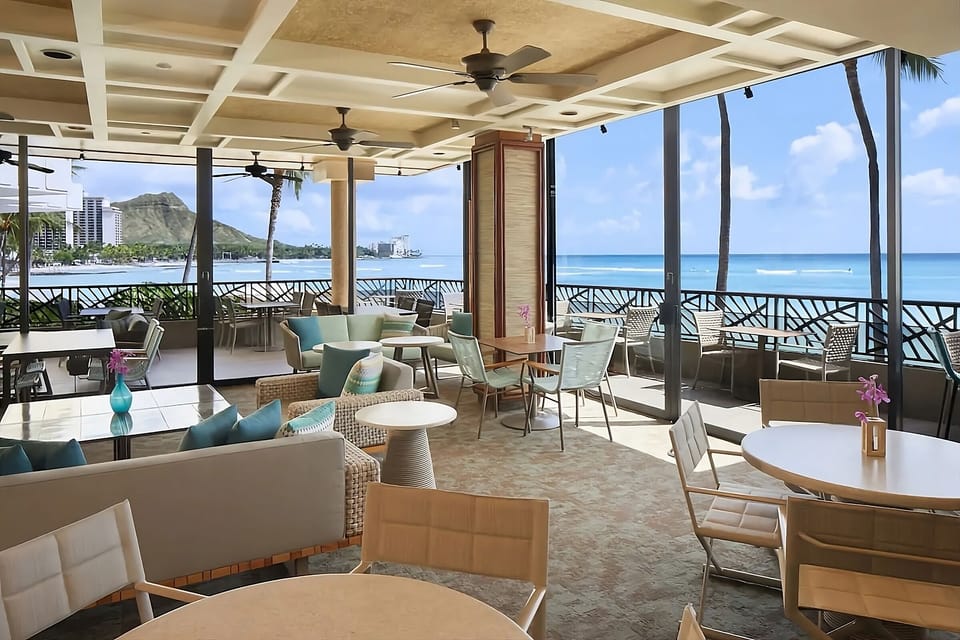 Unwind on the oceanfront terrace with breezy island views.