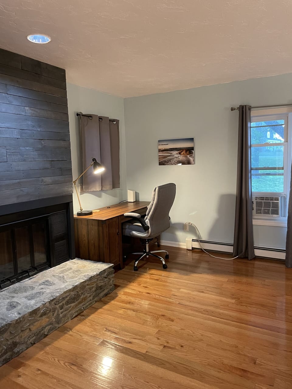 Master bedroom, desk, chair, fireplace