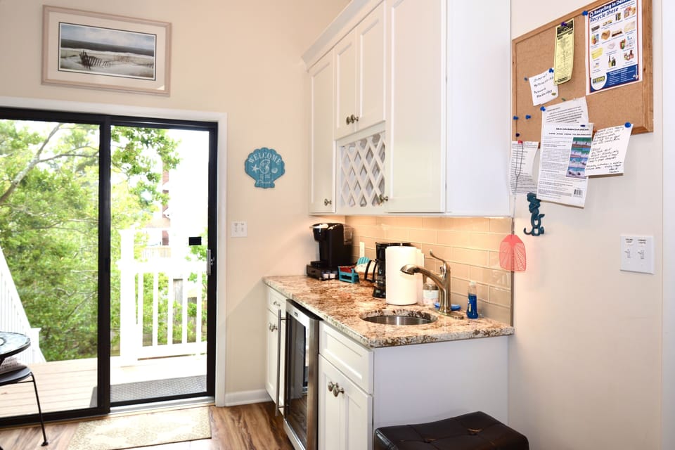 Unit A: Wet Bar Area w/ Wine Cooler and Access to the Balcony