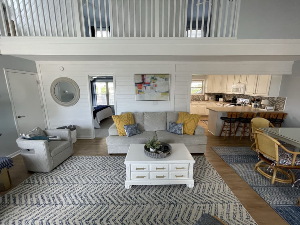 Open floor plan view of family, kitchen and dining area.