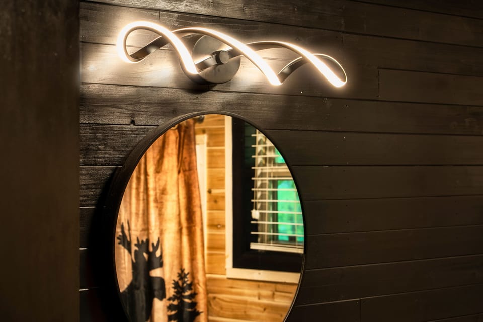 Remarkable Master bathroom with designer light 