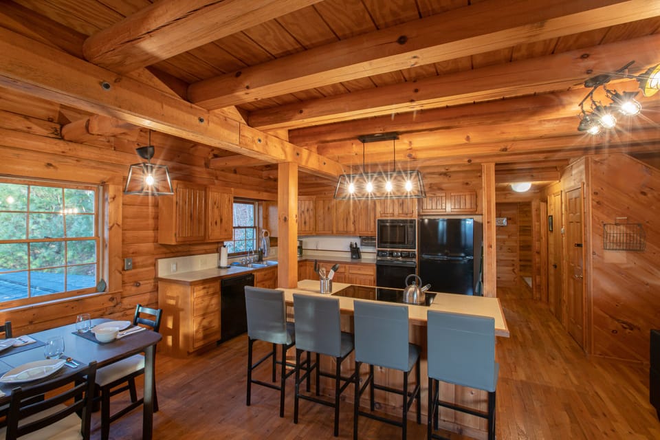 Chat with your cook from a cushioned barstool