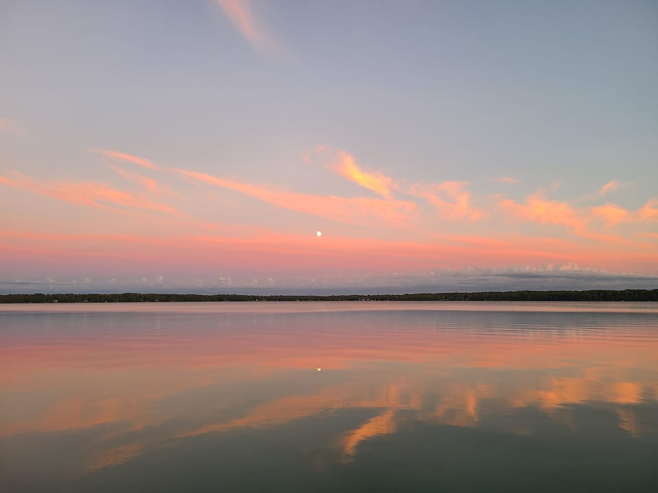 Sunset and summer moon rise 