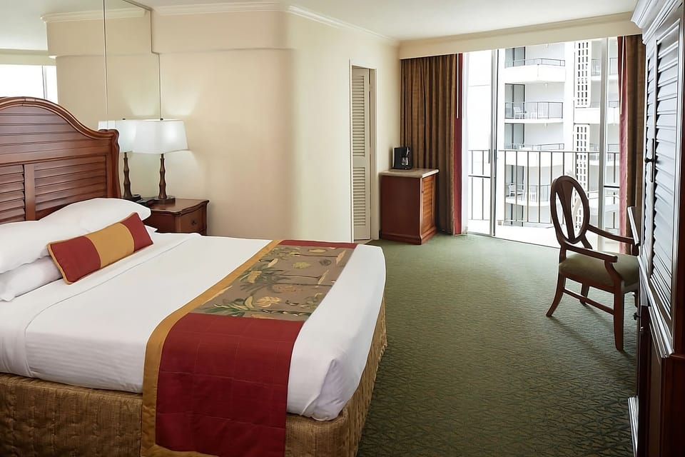 Gather and relax in a spacious room with balcony seating.