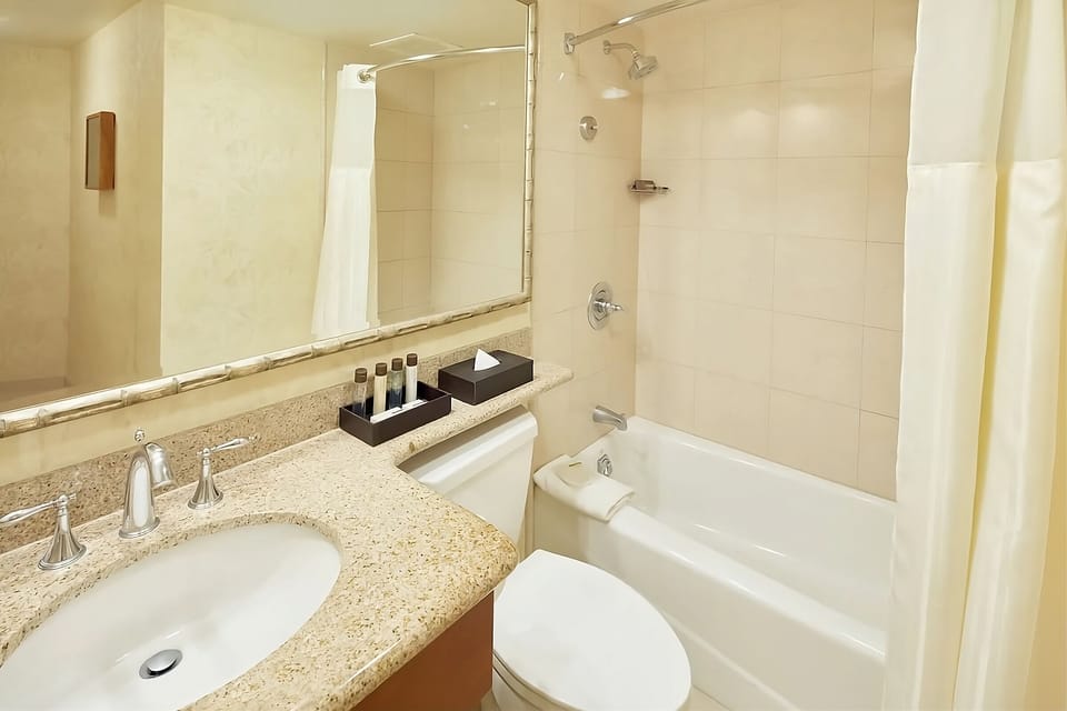 Get ready easily with a wide vanity and bright lighting.