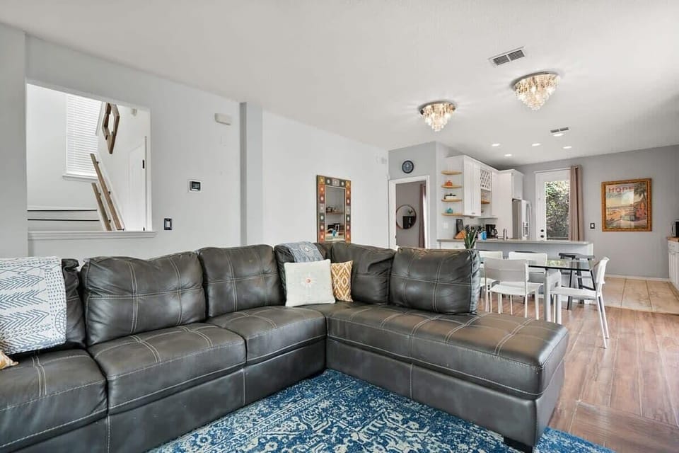 Living room overlooks dining and kitchen