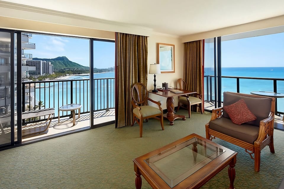 Sip coffee beside sweeping coastline views and gentle breezes.