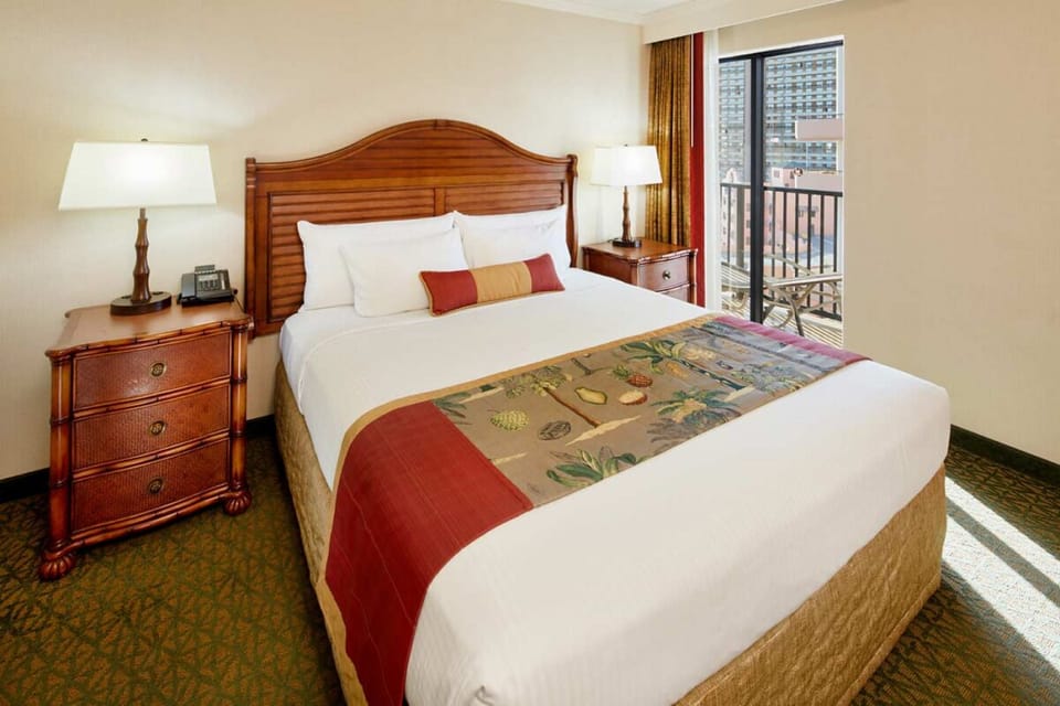 Drift off in a classic room with a private balcony.