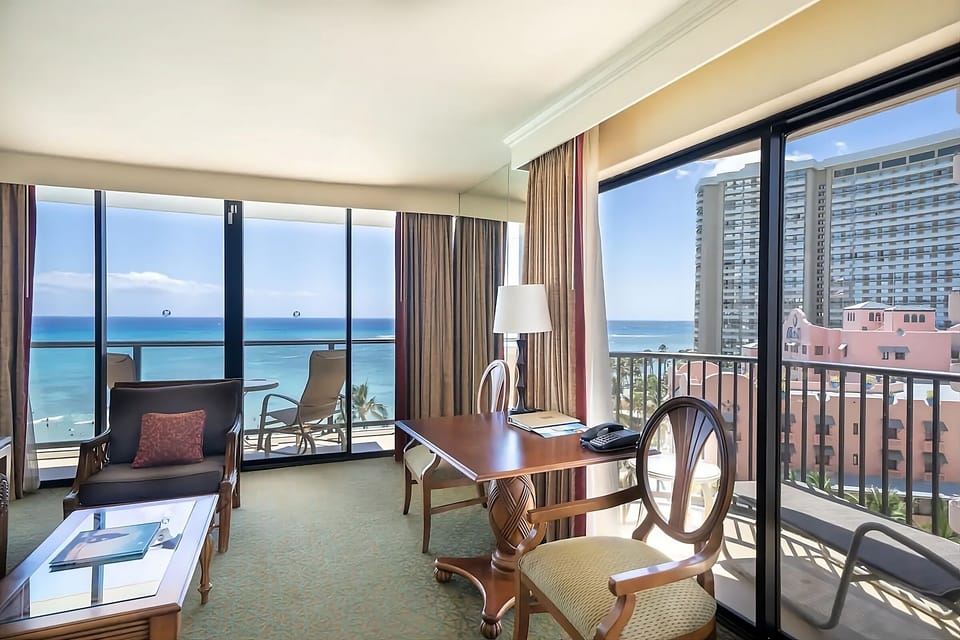 Unwind by panoramic windows with endless turquoise ocean views.
