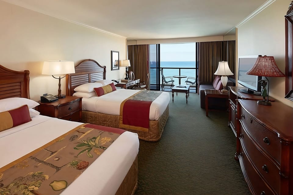 Lounge comfortably with ocean views framed by wide windows.