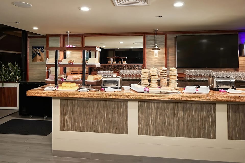Choose your favorites at the bright, welcoming breakfast bar.