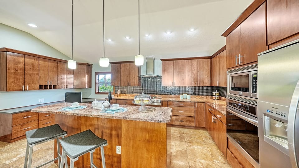 Kitchen island with breakfast bar.