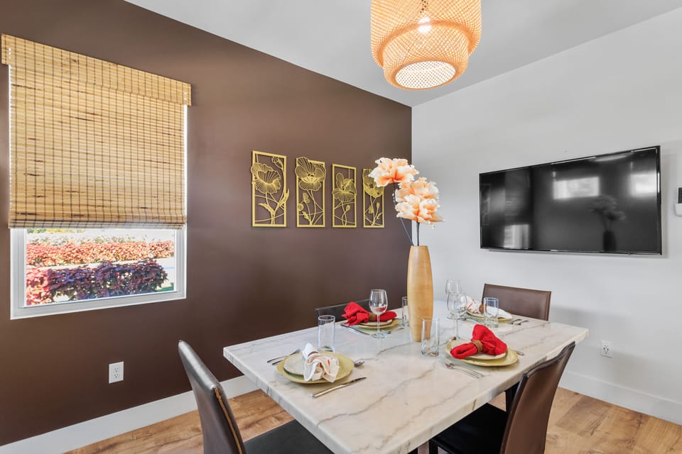 Dining room can also be used as an office with flat screen TV