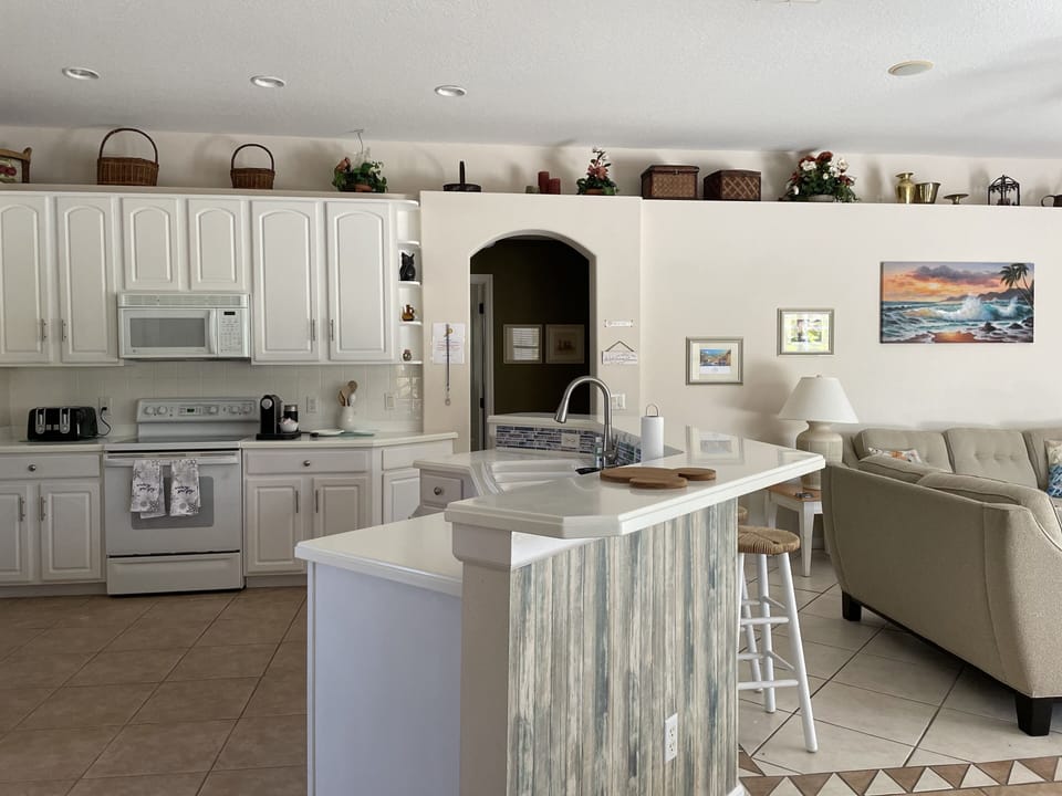 Kitchen viewed from breakfast nook area. 