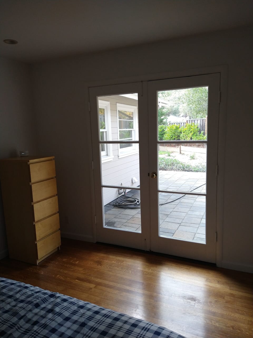 Rear Bedroom window looking out to patio.