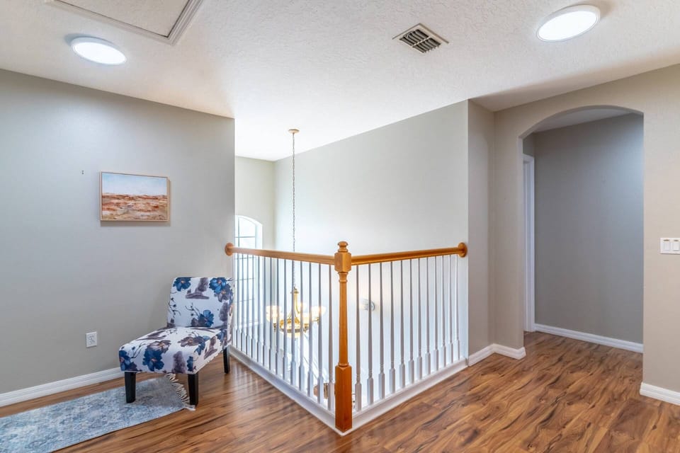 Second floor landing with seating and dedicated work space
