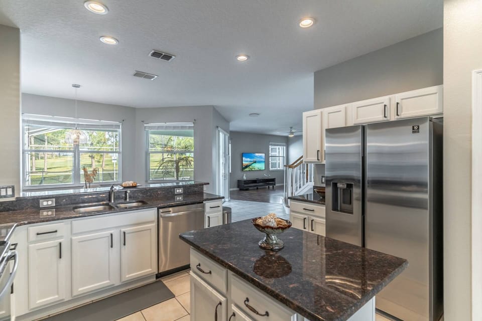 Newly Renovated Kitchen with updated countertops and stainless steel appliances
