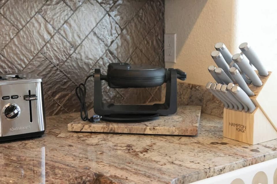 If you enjoy cooking, you'll love our new stainless steel kitchen, which has everything you need to whip up a tasty meal.