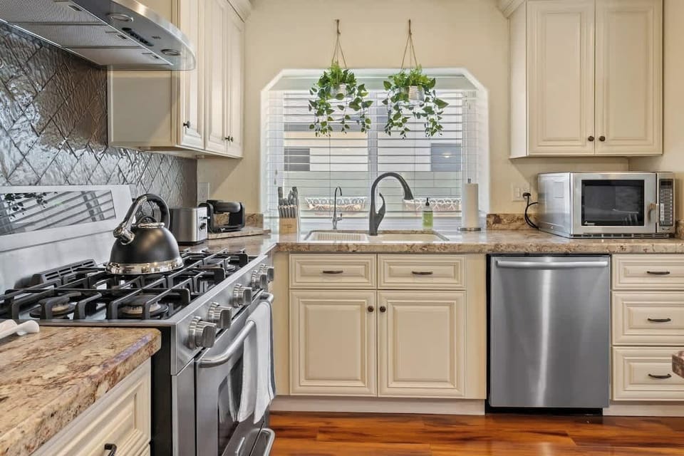 If you enjoy cooking, you'll love our new stainless steel kitchen, which has everything you need to whip up a tasty meal.