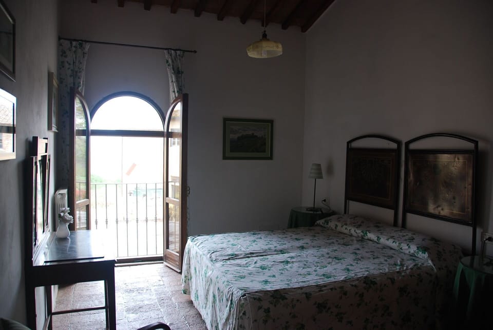 agriturismo-cabbiavoli-chianti-multiproperty-fienile-arancione-pero-bedroom