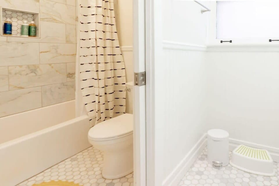 Full bathroom with tub