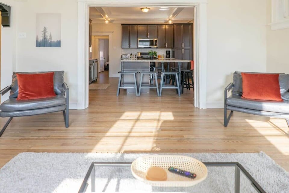 The open concept living space flows into the dining room