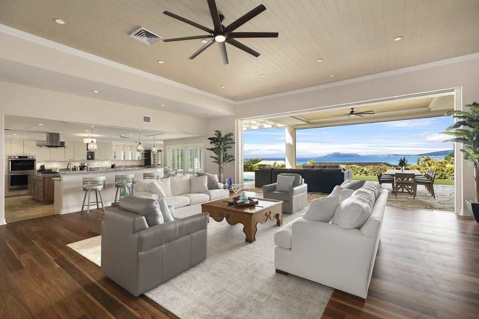Gather with loved ones in the open-concept living space with soaring ceilings.