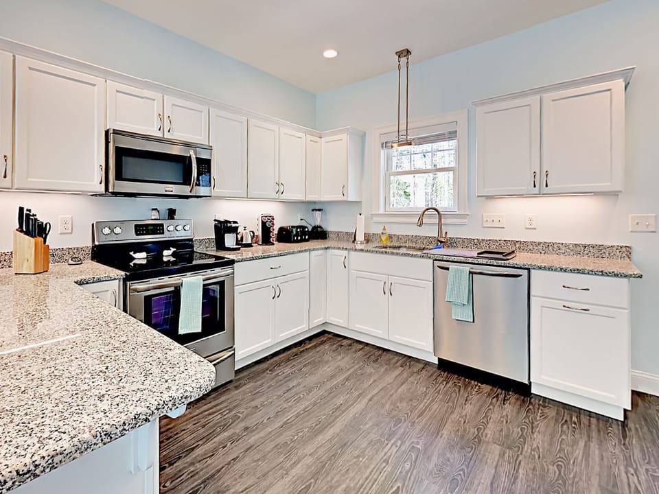 U shaped kitchen with granite counters.  Lots of counter space