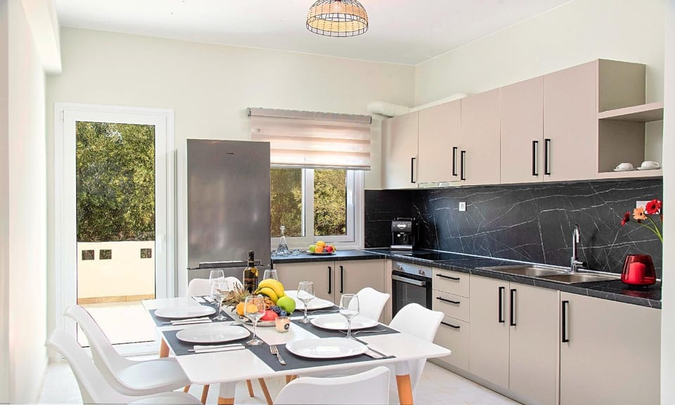 Kitchen area. HotelPraxis Group | Etoile Villa