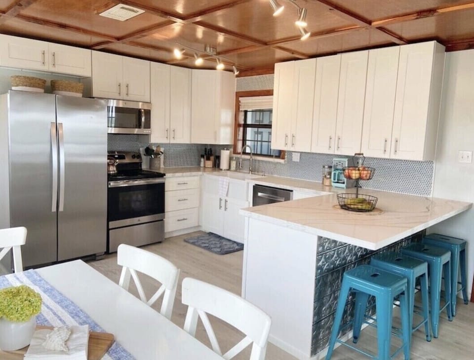 The table pulls out to reveal bench seating if needed, also expands in length.