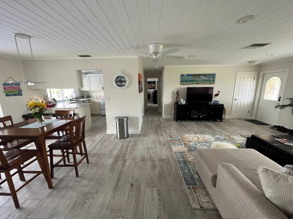 Driftwood ceramic tile floors and wood lined ceilings for that cottage feeling.